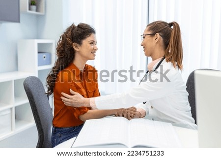 Doctor with patient in hospital. Doctor working in the office and listening to the patient, she is explaining her symptoms, healtcare and assistance concept