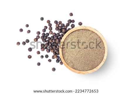 Ground pepper in wooden bowl and black peppercorns isolated on white background. Top view, flat lay. Royalty-Free Stock Photo #2234772653