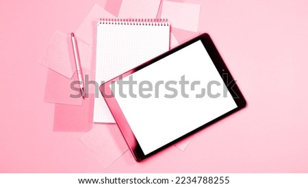 Viva Meganta toned red magenta mock up image black tablet pc white blank screen. Colorful memo sticky pin clips empty notes. Trendy color of the year 2023. Fashion color pattern
