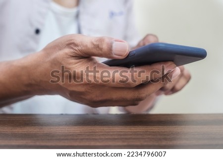 Age of technology People's, Use of technology in the modern era, Interconnection by internet network, Communication with the Internet, Business man using smartphone blurred background