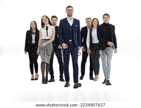 young business people walking behind their leader Royalty-Free Stock Photo #2234807627