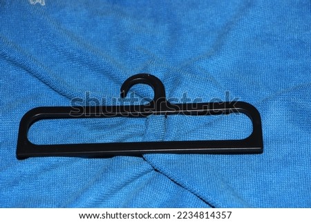 small black coat hanger hang small items