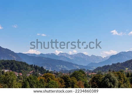 Alpine panorama near Immenstadt with view of the Grünten and the Nagelfluh alpine chain Royalty-Free Stock Photo #2234860389
