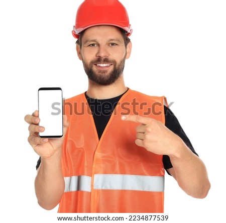 Man in reflective uniform showing smartphone on white background