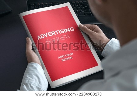 Advertising Banner on Magazine, Brochure Mockup With Hands Royalty-Free Stock Photo #2234903173