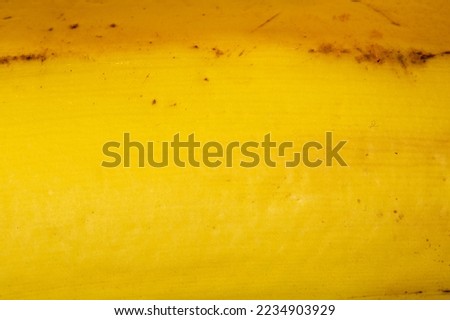 Banana peel texture as a background. A close up shot of a banana peel. Macro photo.