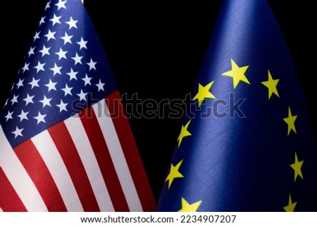 United States of America and European Union flags, concept of bilateral relations, friendship or conflict Royalty-Free Stock Photo #2234907207