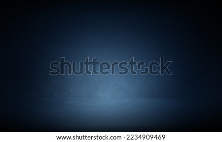 Three dimensional dark concrete room background with blue spot light for photograhy studio background, mock up design or product display