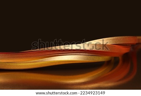 Abstract glow backgound. Gold (bronze) glitter wave on dark brown.