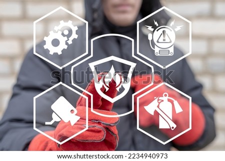 Industrial Smart Automatic Fire Control Extinguisher System. Industry engineer using virtual touchscreen presses button: shield with fire flame. Modern AI Automation Fire Protection Technology. Royalty-Free Stock Photo #2234940973