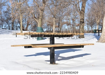 PIcnic Table in the Snow at Lake Minnewashta Regional Park Minnesota 