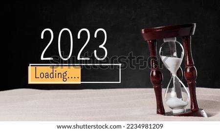 2023 happy new year background design. Greeting card, loading pointer and hourglass