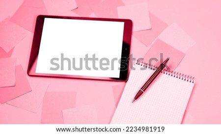 Viva Magenta toned red magenta mock up image black tablet pc white blank screen. Colorful memo sticky pin clips empty notes. Trendy color of the year 2023. Fashion color pattern
