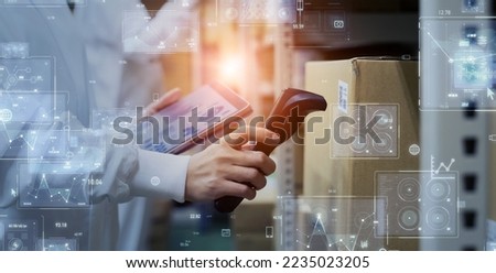 Electronic inventory management concept. logistics tech. RFID. Barcode reader. Royalty-Free Stock Photo #2235023205