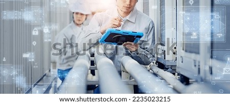 Engineer inspecting equipment and technology concept. Royalty-Free Stock Photo #2235023215