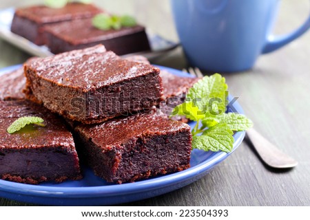 Chocolate and pumpkin brownie slices, selective focus Royalty-Free Stock Photo #223504393