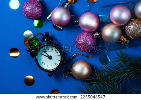 A Christmas or New Year card with a place for text, a place to copy. Christmas tree with pine branches and Christmas balls. a group of Christmas decorations with a place for text. Selective focus.