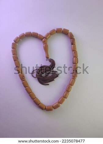 old wooden prayer beads, one for praying for Muslims, grandfather's keepsake, dark brown