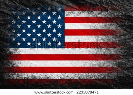 Flag of USA. Flag is painted on black crumpled paper. Paper background. Textured creative background
