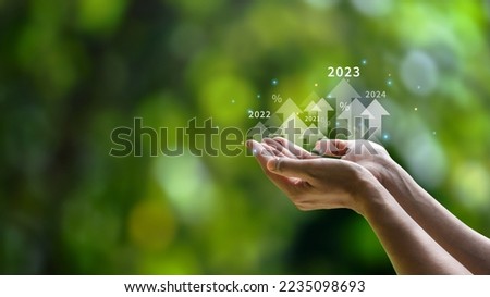 Future planning goals and new visions for the year 2024. Businessman background green environment. with arrow icon increasing future company growth 2024 to 2025 planning opportunities challenges Royalty-Free Stock Photo #2235098693