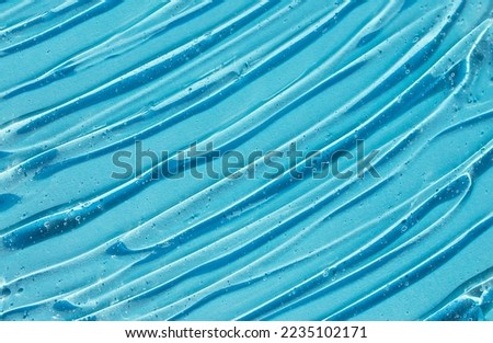texture gel serum on blue background