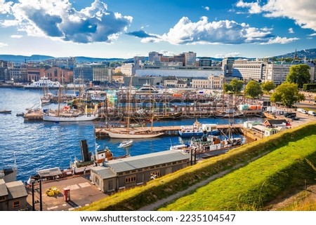 Scenic harbor of Oslo in Aker Brygge view from the hill, capital city of Norway Royalty-Free Stock Photo #2235104547
