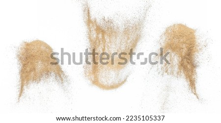 Sand flying explosion, Golden sand wave explode. Abstract sands cloud fly. Yellow colored sand splash throwing in Air. White background Isolated high speed shutter, throwing freeze stop motion Royalty-Free Stock Photo #2235105337