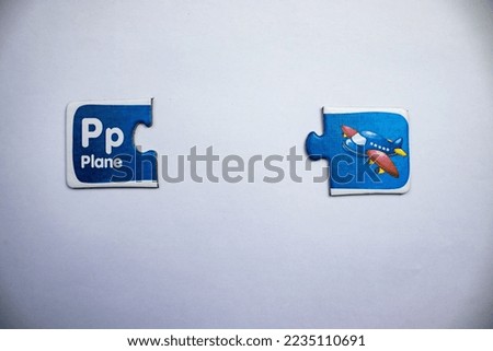 Airplane picture and airplane text puzzles placed separately on a white background.