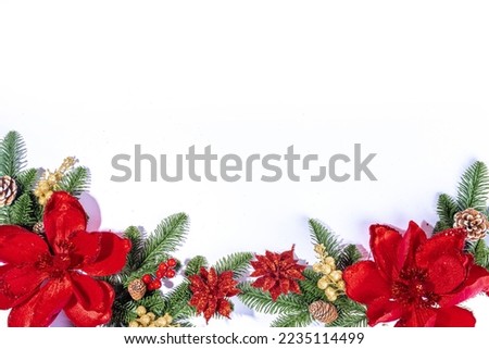 White simple christmas, New Year holidays background with Christmas tree branches, winter red berries, poinsettia flowers, flatlay top view copy space Royalty-Free Stock Photo #2235114499
