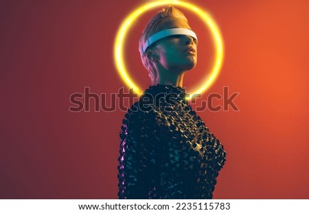 Representation of a bionic super human with advanced technology parts as vr visors and gadgets playing in a mixed reality training room. Futuristic cyberpunk evolution of human mankind and AI Royalty-Free Stock Photo #2235115783