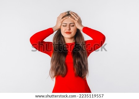 Portrait of a frown woman with closed eyes, touch hands her head, suffers from pounding throbbing tension headache, hate noise feels discomfort unwell. Concept of problems and headache