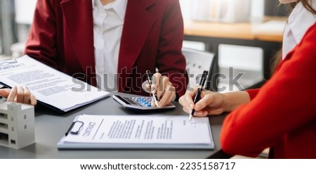 Salesman Hands On House Model , Small Toy House Small Mortgage Property insurance and concepts real estate in office
 Royalty-Free Stock Photo #2235158717