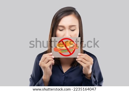 Asian women abstaining from fast food and junk food Royalty-Free Stock Photo #2235164047