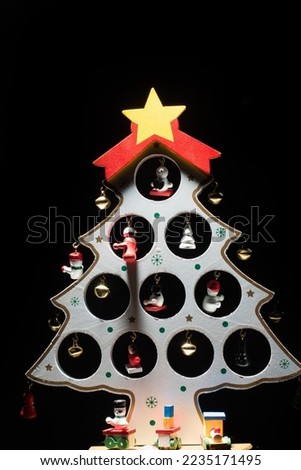 wooden Christmas tree with toys