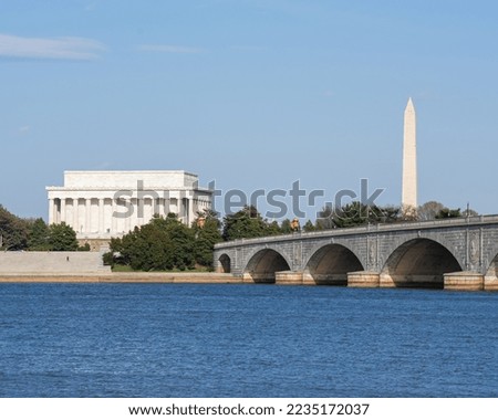 Washington DC, USA skyline on the Potomac River in the afternoon.