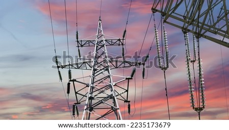 Electricity pylon (high voltage power line) against the background of a romantic evening sky 