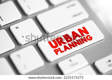 Urban Planning - process that is focused on the development and design of land use and the built environment, text concept button on keyboard