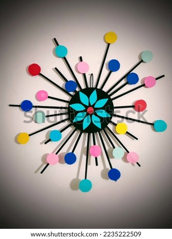 Colourful clock made with craft papers beautiful wall hanging to enhance the beauty of your room