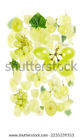 Abstract background made of Green Grape fruit pieces, slices and leaves isolated on white.