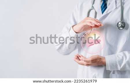 doctor in uniform hands holding liver organ virtual icon, female with hepatitis vaccination, liver cancer treatment. Health checkup concept. Royalty-Free Stock Photo #2235261979