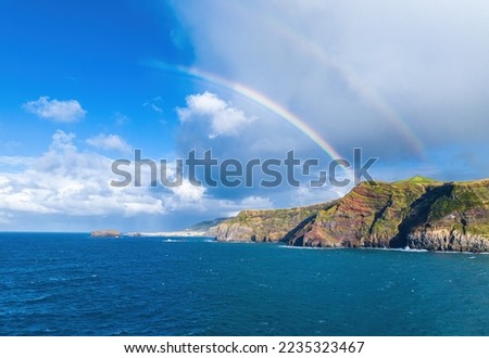 Coastal view and Atlantic Ocean with rainbow, Ponta da Ferraria, Sao Miguel island, Azores, Portugal Royalty-Free Stock Photo #2235323467