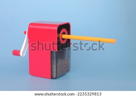 Mechanical pencil sharpener. Quick sharpening of pencils. How to make sharpening pencils easier Royalty-Free Stock Photo #2235329813