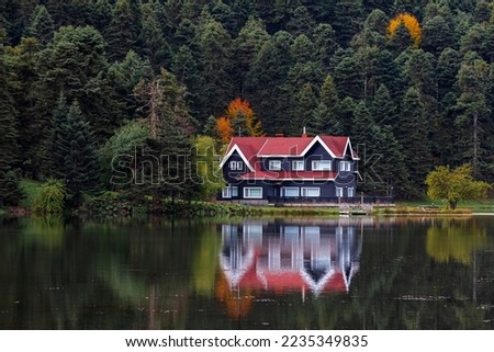Golcuk National Park Bolu Turkey. Autumn wooden Lake house inside forest in Bolu Golcuk National Park, Turkey wallpaper