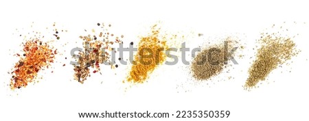 Set spice, spicy mixture of spices,  garam masala, caribbean curry pile, caribbean mix seasoning, oregano isolated on white, clipping Royalty-Free Stock Photo #2235350359