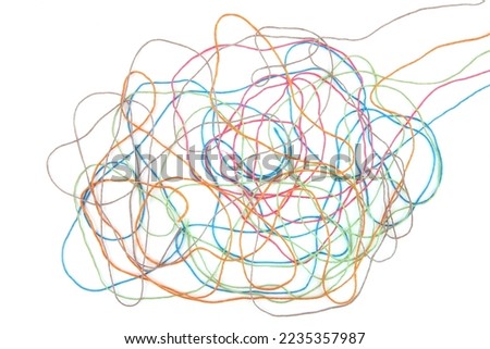 Tangled colorful cotton threads isolated on white background. Abstract thread lines chaos pattern. Royalty-Free Stock Photo #2235357987