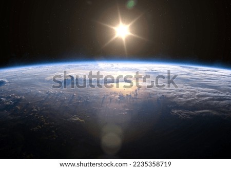 Earth, Sun and Space. Planet Earth with sunrise in the space. Elements of this image furnished by NASA. Royalty-Free Stock Photo #2235358719