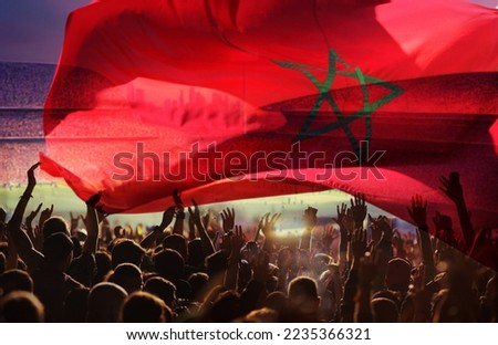 soccer or football fans and Morocco flag Royalty-Free Stock Photo #2235366321