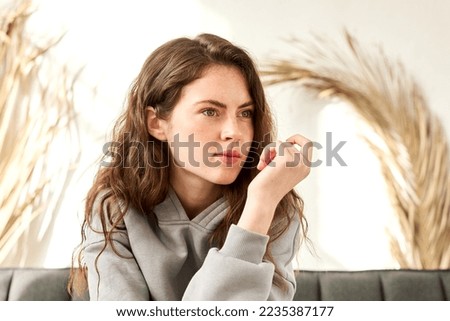 sad woman concept of negative emotions and experiences, dissatisfaction with life, negative thoughts about climate change Royalty-Free Stock Photo #2235387177