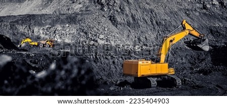 Industry Banner Open pit mine, working excavator loading coal on big yellow mining truck for transportation.
