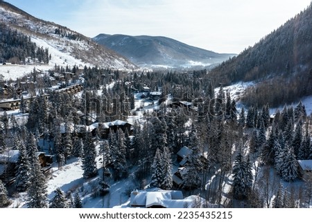 Aerial Drone Photo - Beautiful Vail covered in fresh Winter snow. Colorado Rocky Mountains